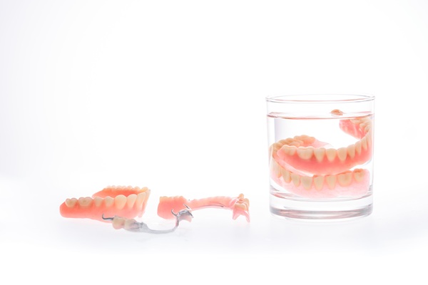 Proper Denture Care: Tips For A Comfortable, Long Lasting Fit